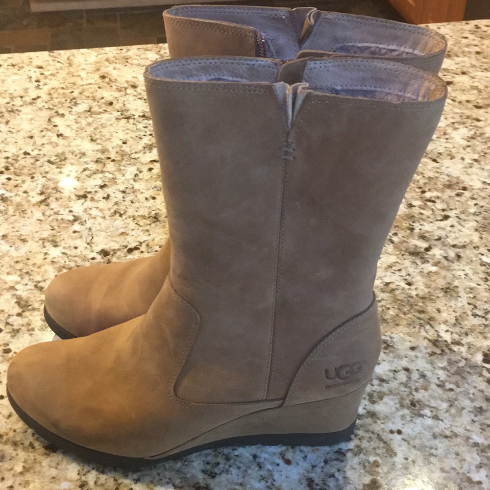 Authentic UGG boots. New!! Worn once!